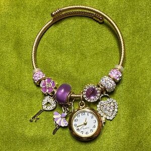 Gold plated and Purple Charm Bracelet Watch
Code #002